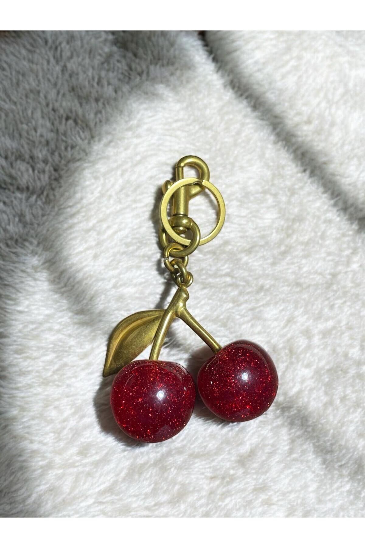 KİRAZ ALTIN DETAYLI SİMLİ  ÇANTA CHARM ANAHTARLIK