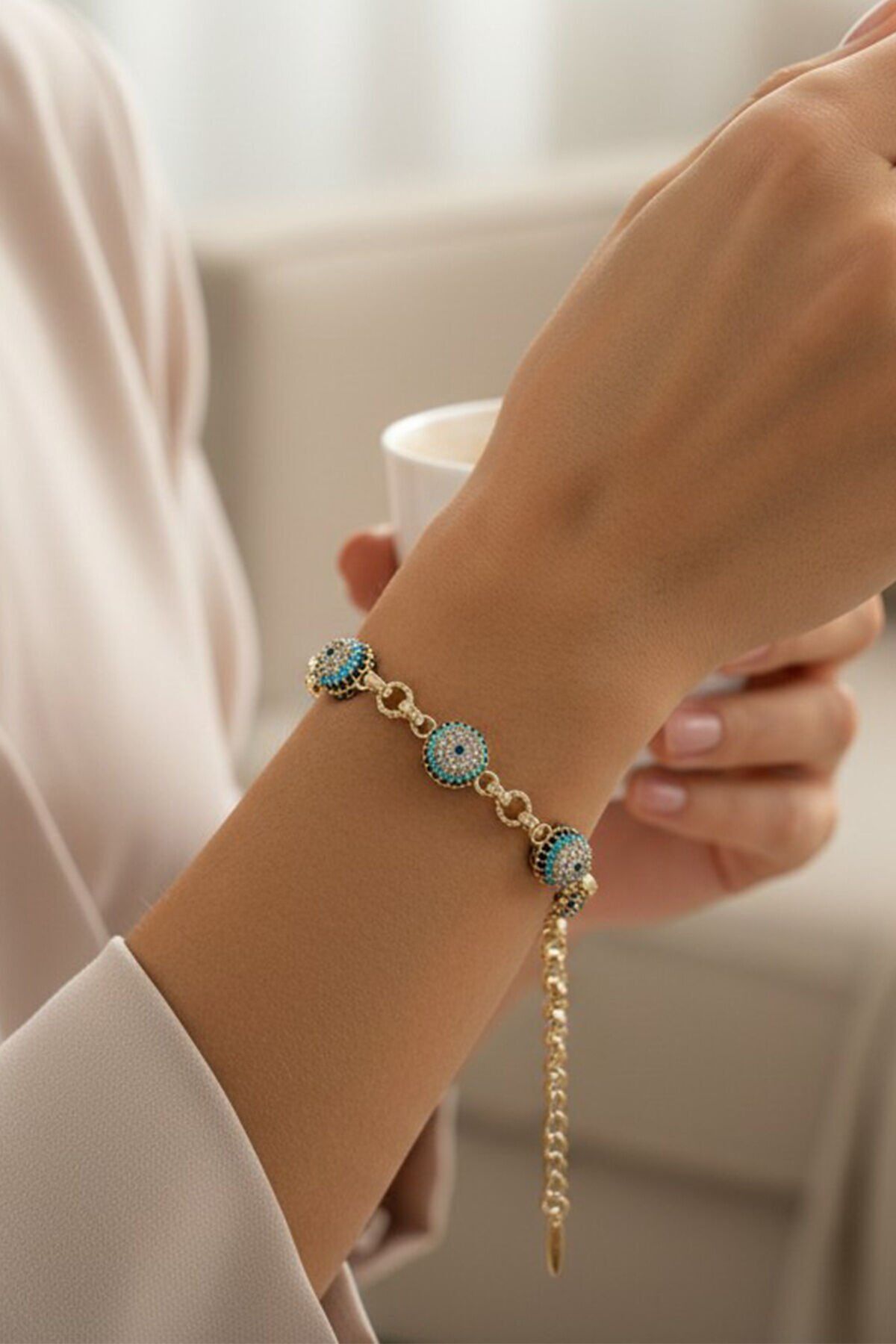 STİL İNCİSİ/XUPING JEWELRY NAZAR BONCUKLU ZİRKON TAŞLI BİLEKLİK